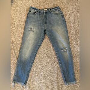 ripped and frayed blue jeans, size 12